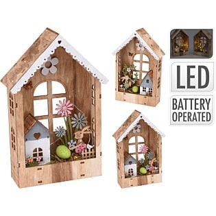 Houten huisje met paasdecoratie